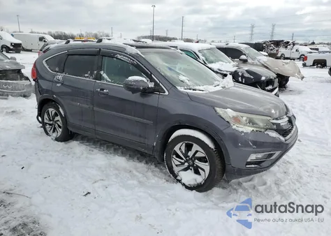 2016 Honda Cr-V Touring z USA, uszkodzony, nr VIN 5J6RM4H9XGL011726
